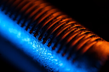 Close up on a professional boom microphone system on black background. © CesareFerrari