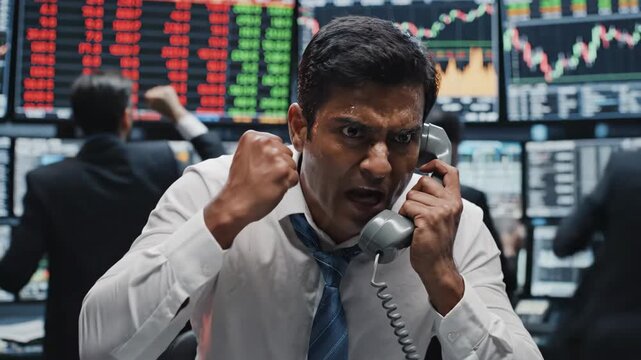 Angry stock trader screaming on the phone during a market crash. Stressed financial professional yelling in a chaotic office environment. Financial crisis concept