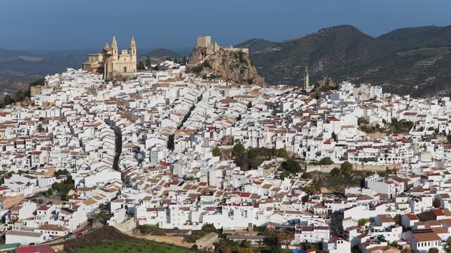 Majestic Olvera: 4K Cinematic Aerial Flyover of the Historic Moorish Castle, Neoclassical Church, and Whitewashed Streets of Andalusia&rsquo;s Capital of Rural Tourism, Spain