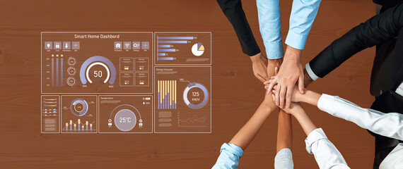 A dynamic team engages around a smart home dashboard interface, showcasing data visualization and metrics in a modern office context, enhancing collaboration and decision-making. Trope