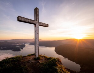 Rugged Wooden Christian Cross Overlooking a Valley at Sunrise