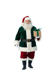 Elderly caucasian Santa Claus with white beard, emerald green velvet suit, red hat, walking, smiling, holding gifts, against soft blurred watercolor pine trees, white snow foreground. Christmas