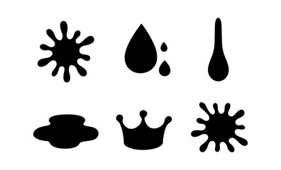 Collection of black ink splatters, drops, and a crown icon on a white background