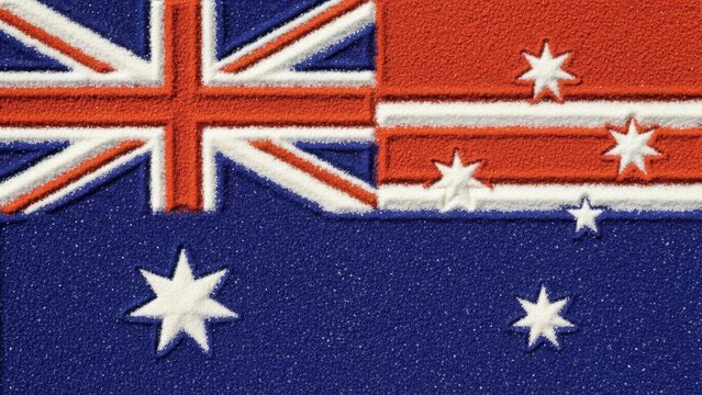 Close-up of the textured Australian flag waving proudly