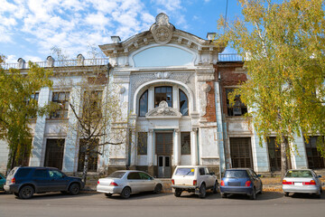 The ancient building of Passage of the merchant Firsov  on a sunny September day, Biysk