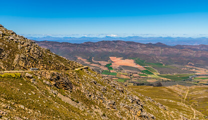 A view along the Swartberg pass across the Swartberg mountains in South Africa in springtime