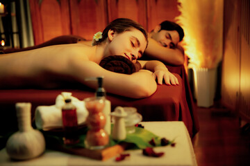 Caucasian couple customer enjoying relaxing anti-stress spa massage and pampering with beauty skin...