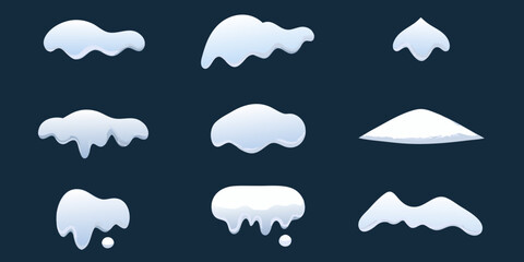 Fototapeta premium Various white snow drifts and shapes isolated on a dark blue background