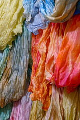 Silk scarves, shawls and neckerchiefs in various colors