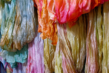 Silk scarves, shawls and neckerchiefs in various colors