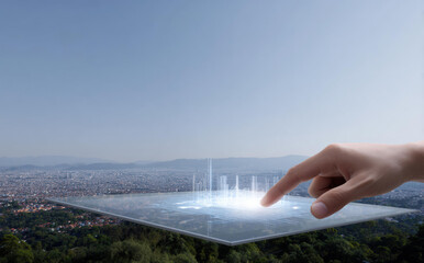 Futuristic transparent tablet with digital city hologram interface in hand against blue sky background expressing ambition for smart technology innovation and development of urban future network