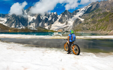 Outdoor Cycling Adventure in a High Mountain Glacier Landscape
