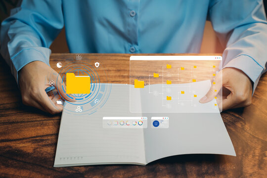 Data management concept. Hands opening notebook with virtual folder interface, file organization, cloud storage, document management, information system, digital archive, workflow efficiency.
