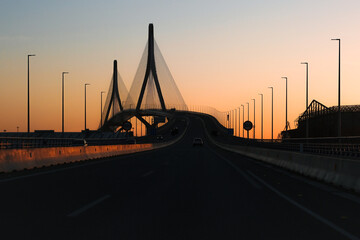 Bridge at sunset. Сable-stayed bridge, unusual bridge, silhouette. Spain, Cadiz © VLAD ANTONOV
