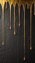 Golden liquid dripping down black surface