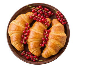 A plate of croissants with red berries on a brown plate isolated on transparent background