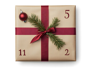 Top view of Christmas gift box wrapped in brown craft paper on white background