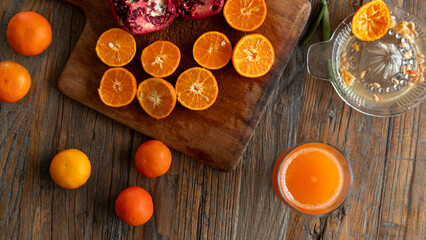 a glass of citrus fruit juice on table
