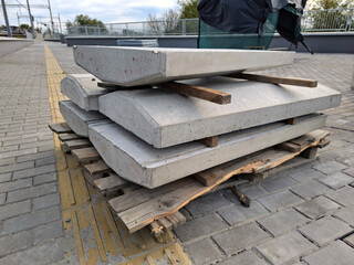 Concrete structures, blocks for supporting metal railings on railway platform