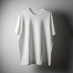 A pristine white t-shirt hangs casually on a wire hanger, its clean lines and soft texture ideal for design mockups.