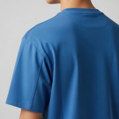 Back view of a blue t-shirt, showcasing sporty seam details and athletic fit