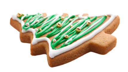Delicious homemade Christmas gingerbread man cookies with colorful icing decoration on a white and wooden background for a sweet holiday snack