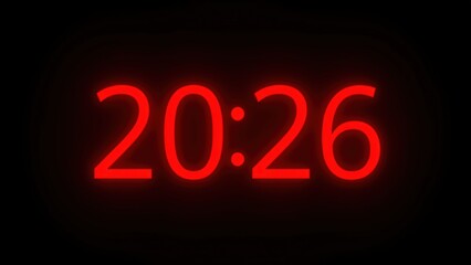 A bright red digital clock display showing the time 20:26 on a dark background with glowing red numbers and a black screen