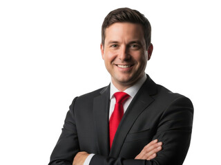 Confident smiling businessman in a dark suit and red tie with arms crossed, isolated studio portrait.