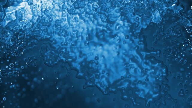 Blue Lumpy Glass Morph 4K Loop features a heavily textured glassy blue surface moving and morphing in a loop.