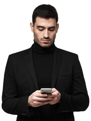 Focused businessman in black suit using smartphone for business communication and mobile work tasks