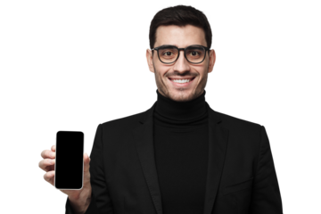 Smiling businessman showing blank phone screen for app presentation in black suit with glasses