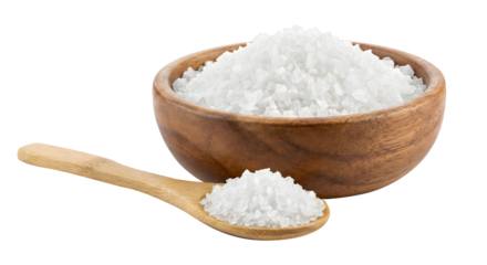Wooden bowl full of coarse sea salt with spoon on transparent background