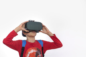 Young boy wearing virtual reality headset exploring immersive digital world, child using VR technology for education, gaming and future learning isolated on white background