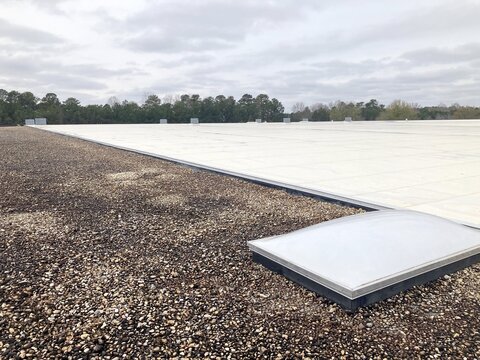 TPO and Ballast type roofing with a skylight