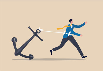 Freedom, relief or escape from bad habit, psychology anchoring effect or cut heavy burden to growing more concept, businessman using scissor to cut the rope tie himself with big heavy anchor. © Premium art