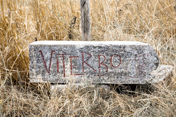 way marker in the countryside showing the direction to Viterbo, Lazio, Italy
