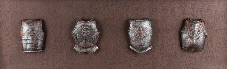 collection of steel knightly breastplates