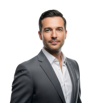 Professional studio portrait of a successful and charismatic man in a gray suit, looking directly at the camera with a warm, inviting smile