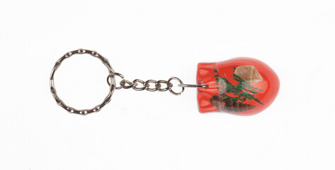 Amber shell keychain isolated on white background