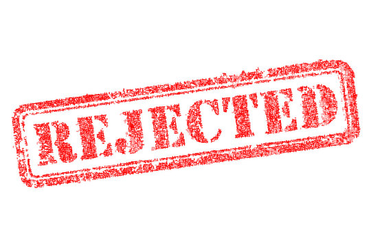 Red grunge vector rejected rubber stamp isolated on white. Distressed ink texture seal for disapproval, denial, refusal, and negative business decisions. Commercial office stationery imprint sign.