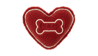 Red heart-shaped plush dog toy made from soft sherpa fabric features a white embroidered bone with two small paw prints in the center, seen from a flat lay perspective