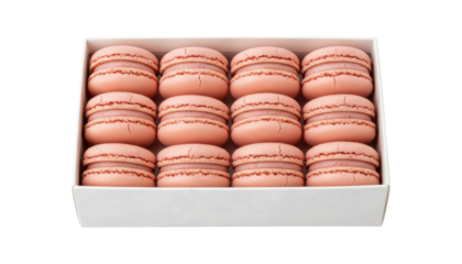 Dozen pink almond meringue macarons neatly arranged in three rows inside an elegant white gift box with a subtle floral pattern, viewed from above