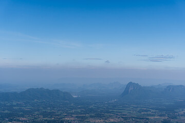 Serene Mountain Landscape Under Clear Blue Sky at Dusk