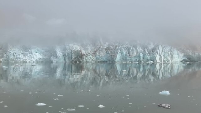 Rasmussen Glacier covered by fod in arctic ocean, Greenland