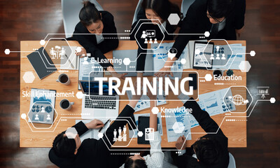 Collaborative Training Session in Modern Office Setting Focused on Learning, Knowledge, and Skill Enhancement with Diverse Professionals Engaged Around a Table. Amity