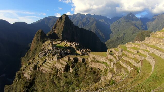 Terraces and the Guardian's House at the Machu Picchu Sanctuary in the Eastern Cordillera, with the specific rock formation of Huayna Picchu in the background. Peru, Cusco Region