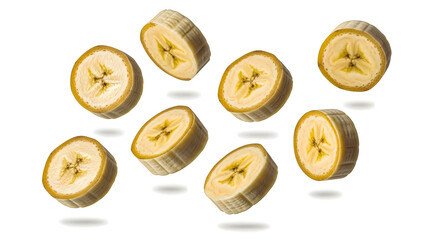 Sliced bananas floating in the air, isolated on white background