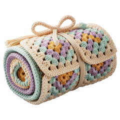 Rolled granny square crochet baby blanket with ribbon bow, handmade yarn throw isolated on white background