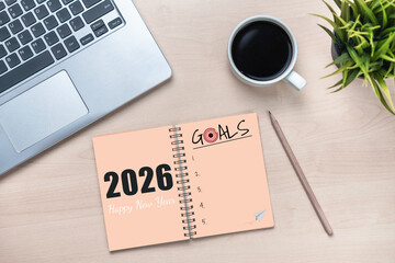 2026 Happy New Year Resolution Goal List and Plans Setting - Business office desk with notebook written about plan listing of new year goals and resolutions setting. Change and glee concept.