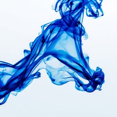 Ink swirling gracefully in clear water creating captivating shapes and patterns